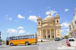 The Parish Church Assumption and a maltese bus