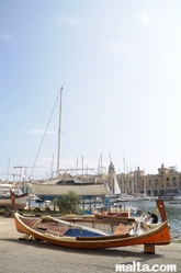 Luzzu docked in Senglea Luzzu docked in Senglea
