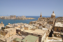 View of the roofs of Valletta with Carmelite Church and Sliema in the background