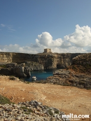 The Santa Maria Watchtower and cliff in Comino