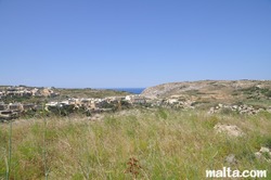 View of Fontana countryside and Xlendi at a distance.