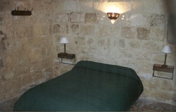 Double bedroom at ta lonza farmhouse