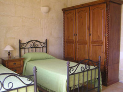 another twin bedroom at ta natu farmhouse gozo