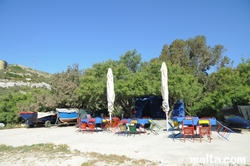 colourful tables at Mgarr Ix-xini Bay colourful tables at Mgarr Ix-xini Bay