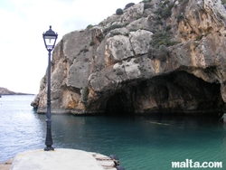 Cave in the Xlendi Bay Cave in the Xlendi Bay
