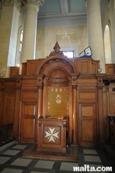 high-backed chair in St Paul Anglican Church Valletta high-backed chair in St Paul Anglican Church Valletta