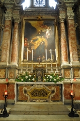 side altar with flowers in St. john's cathedral valletta