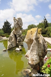 Rocks in a fountain inside the Garden of Serenity in Santa Lucija