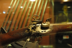 detail of a shotgun in the palace armoury in valletta