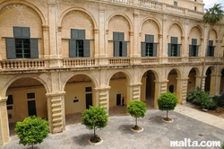 arches in the inner courtyard of the Grandmaster Palace in Valletta
