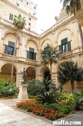 back garden and statue in the Grandmaster Palace in Valletta