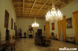 table and chandeliers in in the Grandmaster Palace in Valletta