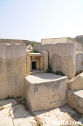 carved limestone and door at tarxien temples