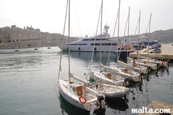 Small sailing boats and Yachts in the Vittoriosa Birgu Marina Senglea in the background.