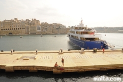 Big yacht in the Vittoriosa Birgu Marina and Senglea in the background