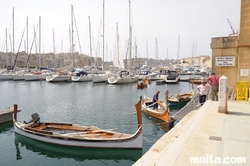 Luzzu Taxi boat to Valletta and Sliema in Vittoriosa Birgu