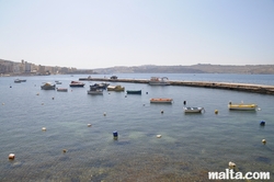 Bugibba's harbour and the sea wall Bugibba's harbour and the sea wall