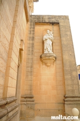 Statue on the side of the St Mary's Church in Dingli
