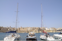 Boats on shore of Kalkara and Vittoriosa Birgu on the background