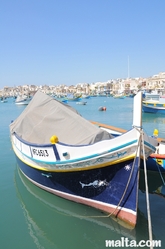 Traditional Luzzu boat in Marsaxlokk