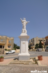Christian statue in front of the Mensija chapel of St Gwann Christian statue in front of the Mensija chapel of St Gwann