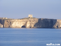 Comino's St. Mary's Tower above the cliff