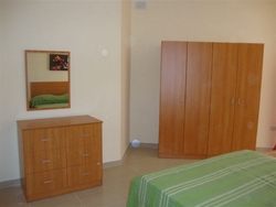 Modern double bedroom at Belmont Court Qawra