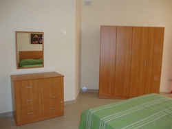 Modern double bedroom at Belmont Court Qawra Modern double bedroom at Belmont Court Qawra
