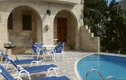 pool and deck area at ta lonza farmhouse