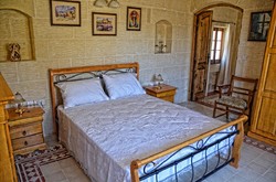 main bedroom at ta karmena farmhouse gozo