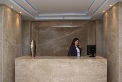 Panorama hotel mellieha reception desk.