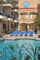 Pool area at the White dolphin complex qawra