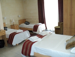 Triple room at the Point de Vue guesthouse