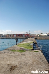 St Thomas Bay dock and snack near Marsascala