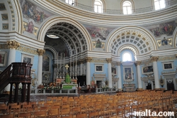 central and side altars in the Mosta Dome