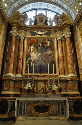 side altar with candles in St. john's cathedral valletta