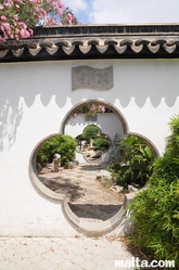 Artistic door entrance to another part of the Garden of Serenity in Santa Lucija
