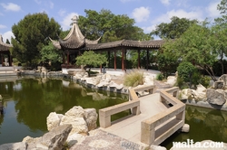 Bridge and side path of the Garden of Serenity in Santa Lucija