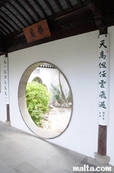 Door and Calligraphy in the Garden of Serenity in Santa Lucija