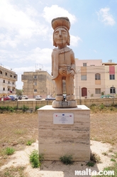 wooden statue given by Slovakia in the Garden of Serenity in Santa Lucija