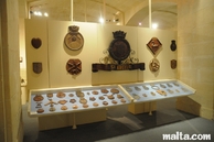 Wooden plaques in the royal navy hall of the Maritime Museum in Victoriosa