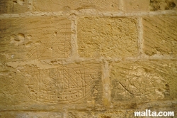 luzzo and eye carvings in  the old prison museum in Gozo