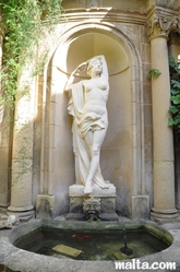 Statue inside the Garden of the Casa Rocca Piccola in Valletta