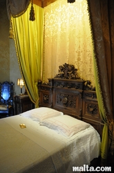 bed in Palazzo Parisio