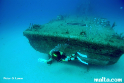 Diver exploring side of P29 Diver exploring side of P29