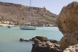 Beautiful view of Nautica sailing boat and beach