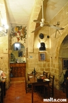 Tables and decoration of the Grotto tavern Restaurant