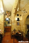 Tables and decoration of the Grotto tavern Restaurant Tables and decoration of the Grotto tavern Restaurant