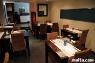 Dining room from the kitchen of Serafino Restaurant