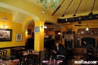 Tables and decoration of the Ta'Kris Restaurant and Maltese Bistro's dining room